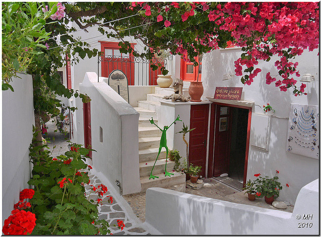 Colourful flowers surrounding a cafe and gift shop in Naxos, Greece